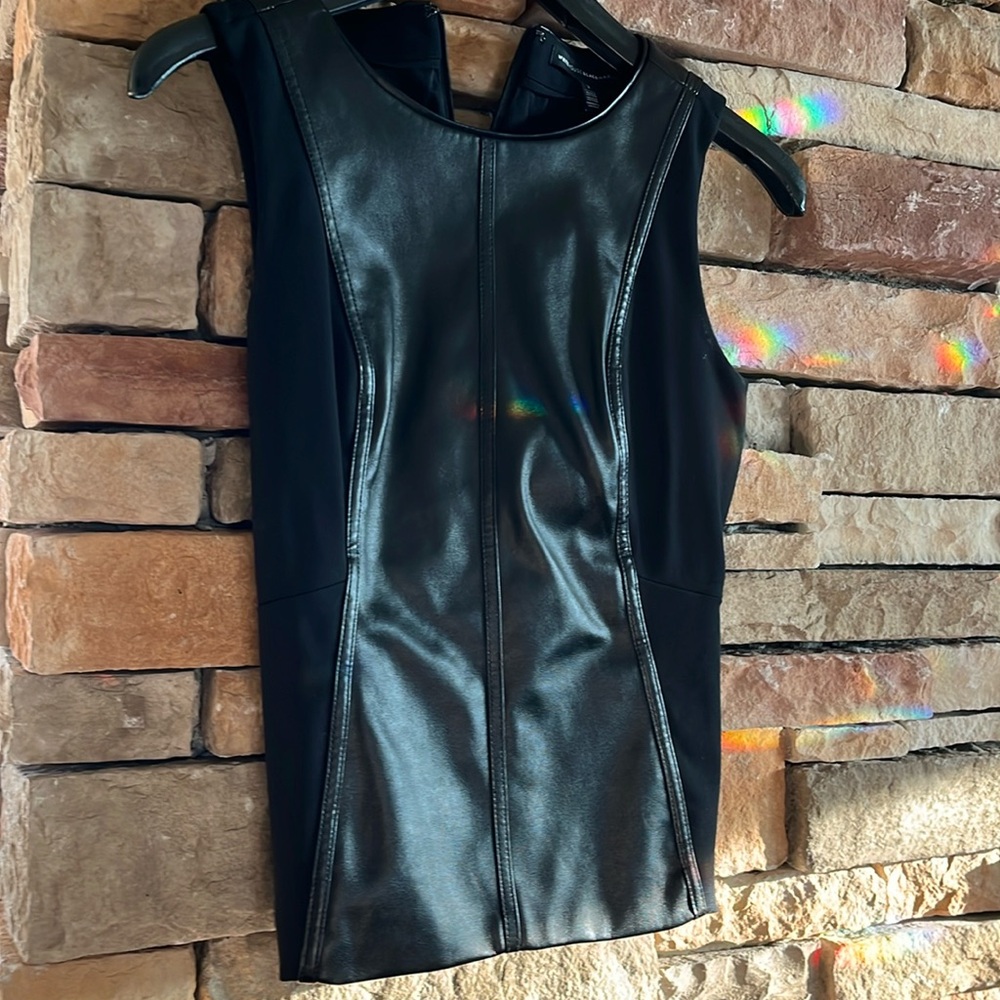 White House black Market partial leather-like shirt. Other part is stretchy